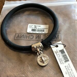 Marc By Marc Jacobs Black silicone Bracelet with Silver tone Charm. New with tag
